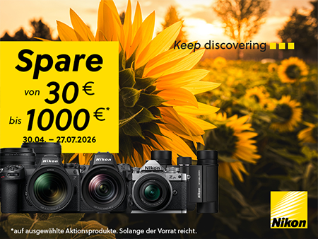 Nikon Sommer-Rabattaktion mit spiegellosen Kameras und Objektiven vor einem Sonnenblumenfeld. Große gelbe Rabattbox mit dem Hinweis „Spare von 30 € bis 1000 €“ sowie Aktionszeitraum vom 30.04. bis 27.07.2026.